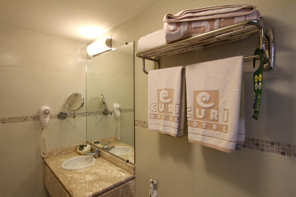 Hotel Curi Executive Pelotas Pokoj fotografie