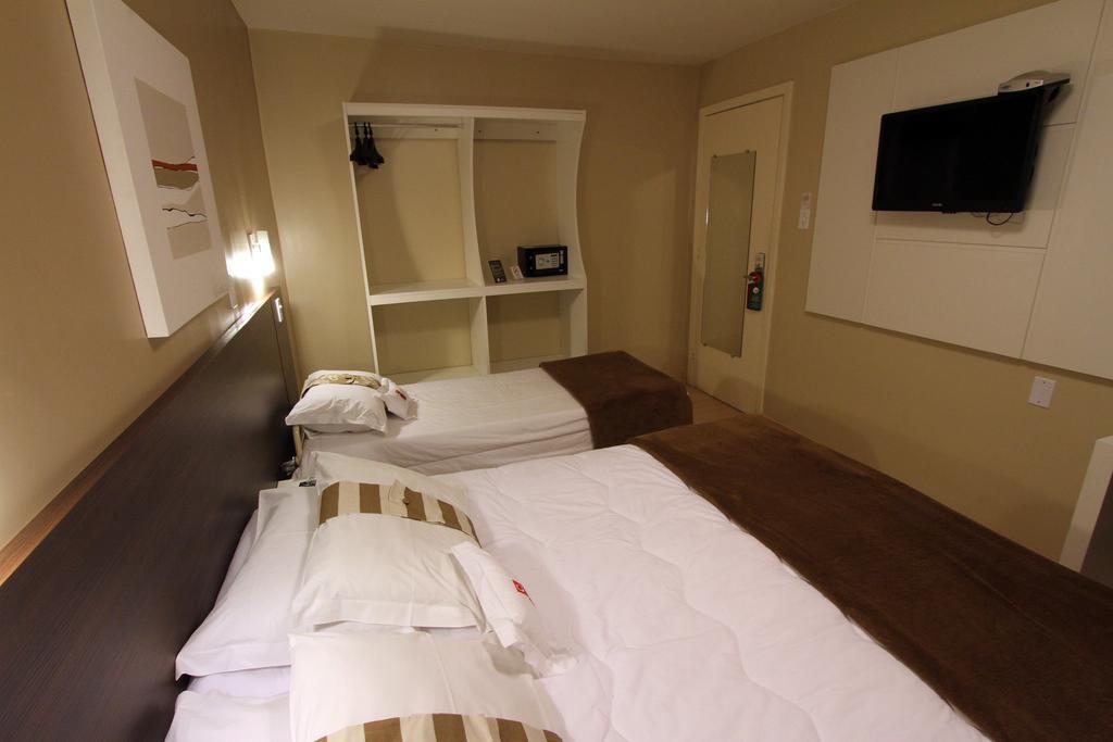 Hotel Curi Executive Pelotas Pokoj fotografie