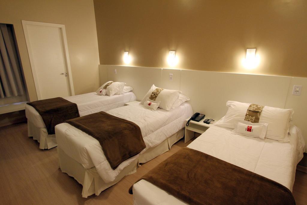Hotel Curi Executive Pelotas Pokoj fotografie