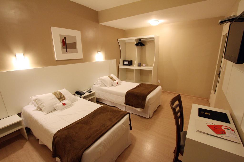 Hotel Curi Executive Pelotas Pokoj fotografie